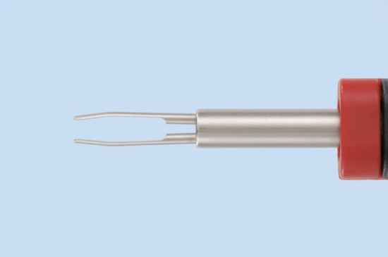 Izvlekač za kabelske končnike z dvema jezičkoma